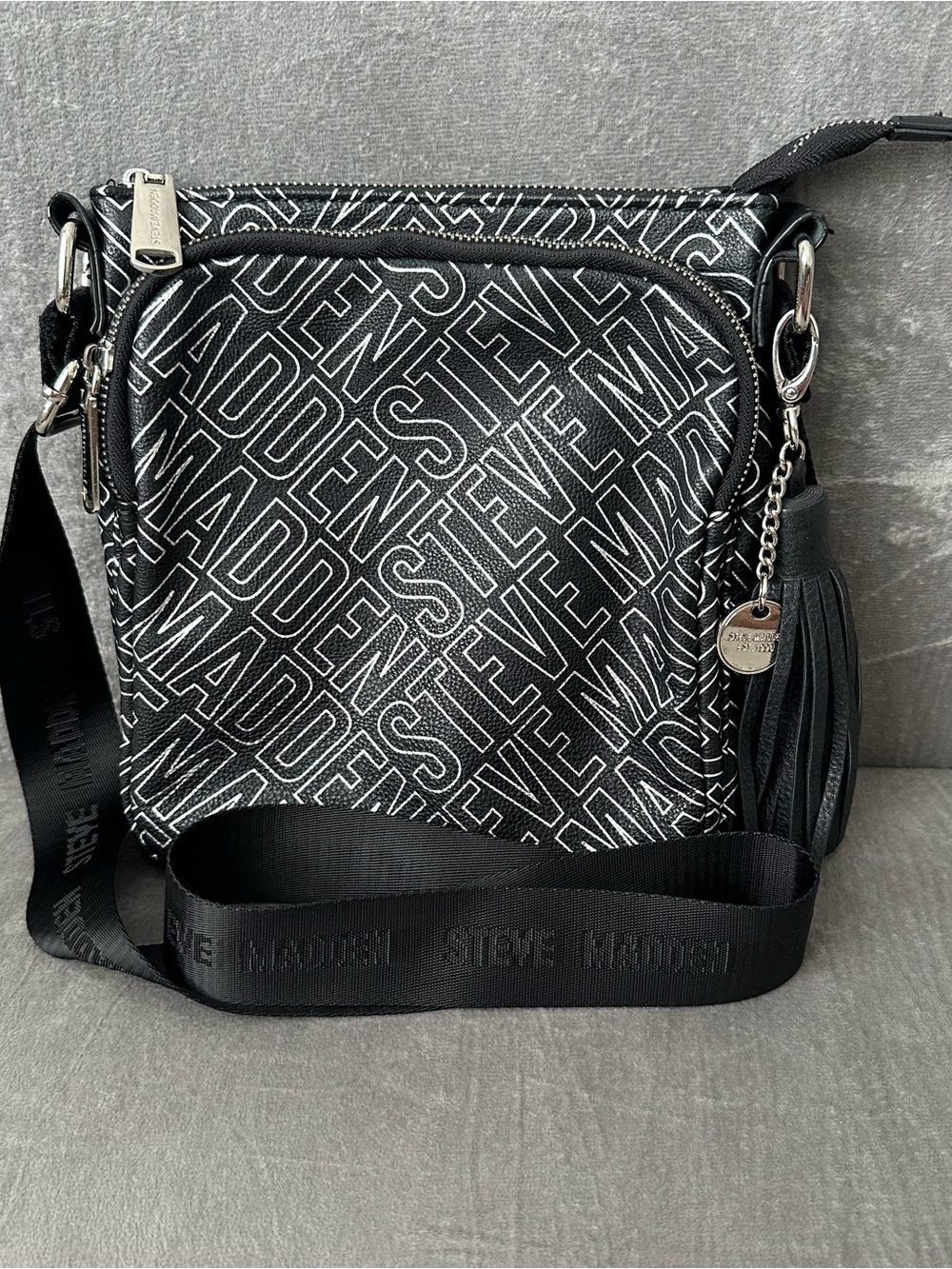 Steve Madden Textured Black Logo Crossbody Bag With Tassel Charm